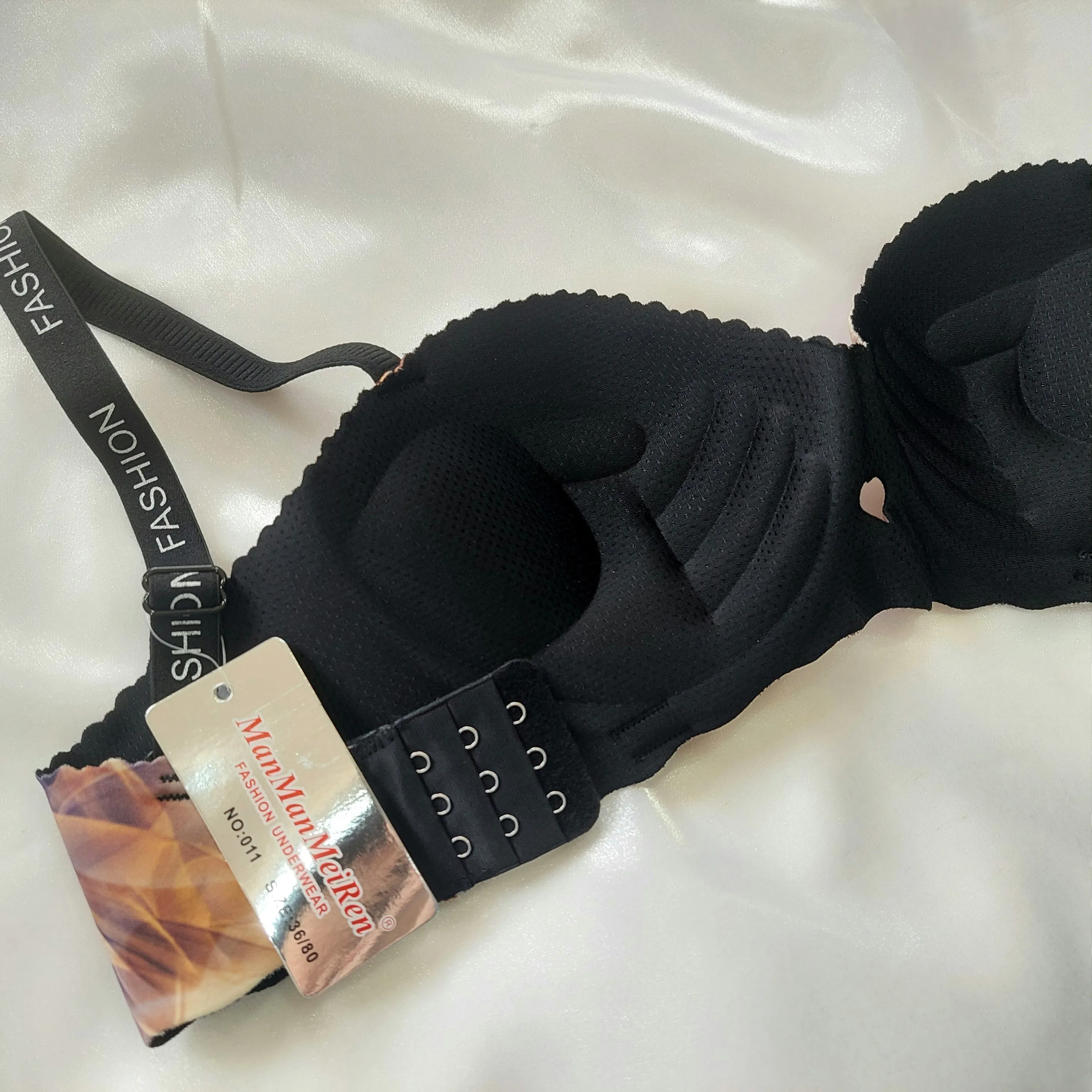 سوتین نیم کاپ دکلته لیزری جک دار طرح آبرنگی حجم دهنده