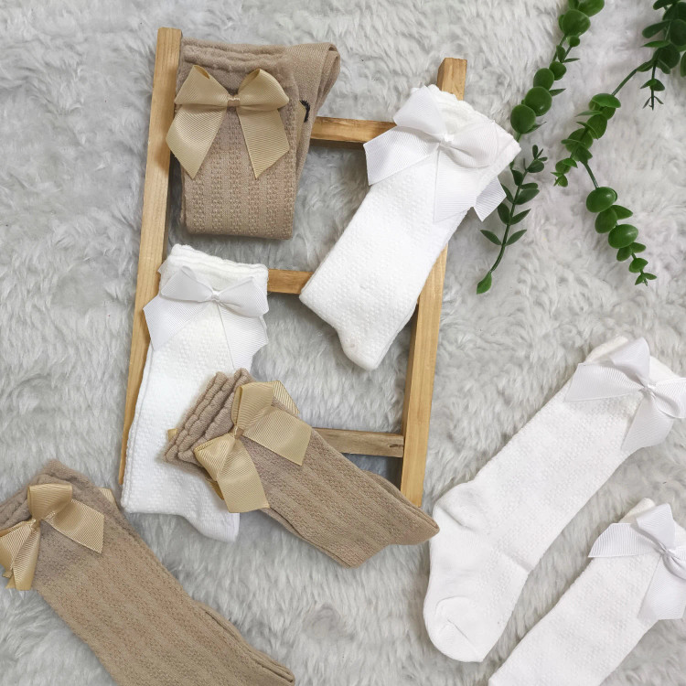 جوراب نخی نیم ساق دخترانه طرح گندمی با پاپیون (مناسب 6 ماه تا 6 سال)