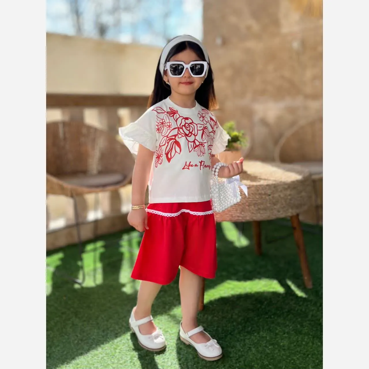 ست کراپ و شلوارک دخترانه طرح گل جنس یک رو پنبه رنگ قرمز