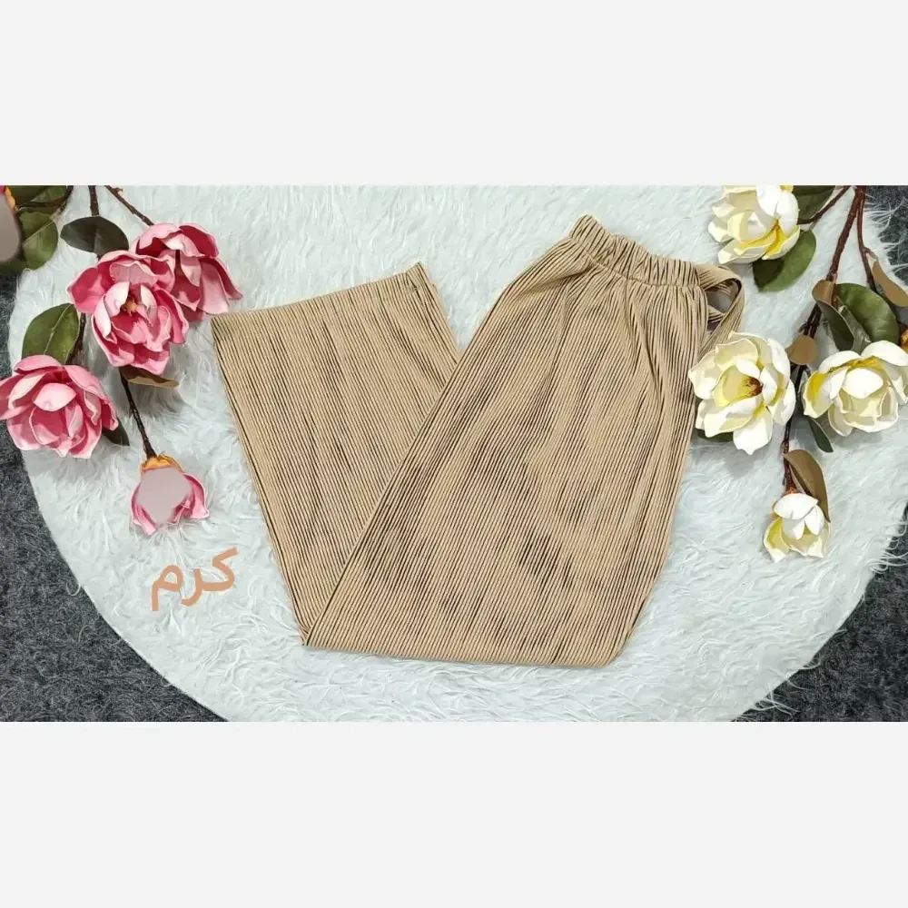 شلوار بگ پلیسه زنانه جنس زیکو گرم بالا فری سایز رنگ کرم و زیتونی