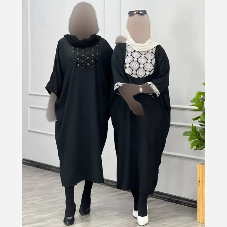پیراهن جولیا جنس ابروبادی رنگ مشکی برگ طلایی فری سایز