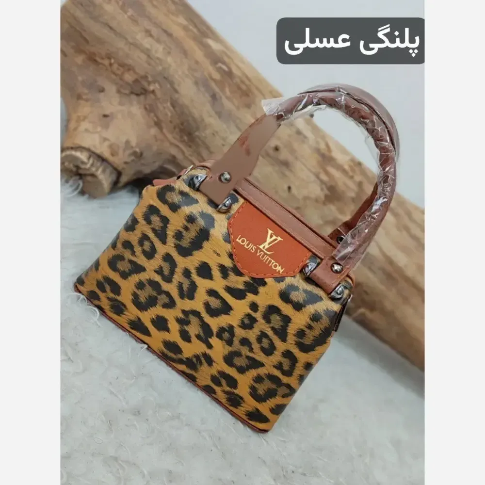 کیف مجلسی مدل صدف چرم صنعتی ابعاد 22 در 18