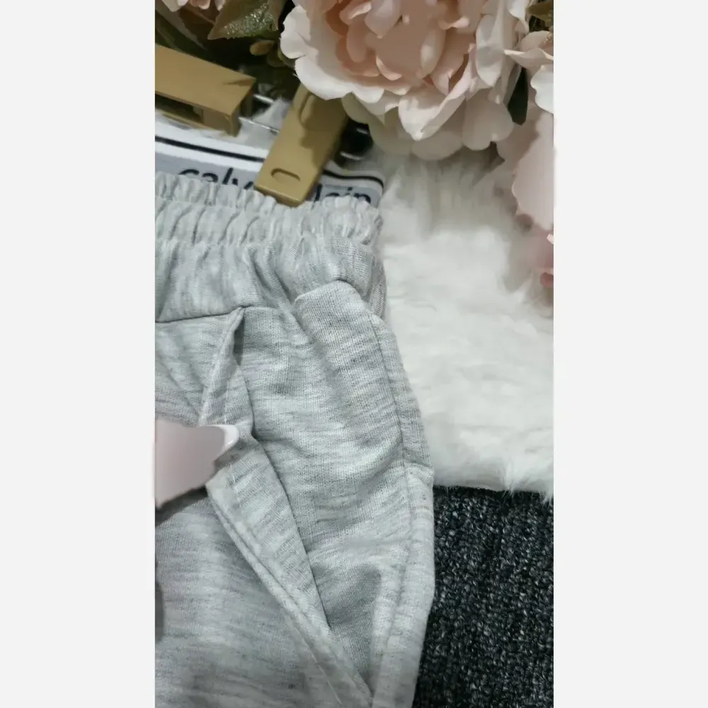 شلوار جاگر کلوین ملانژ درجه یک زنانه فری سایز مشکی طوسی