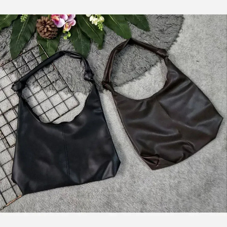 کیف چرمی بند گره ای زنانه مشکی و موکا آزاد سبک جادار