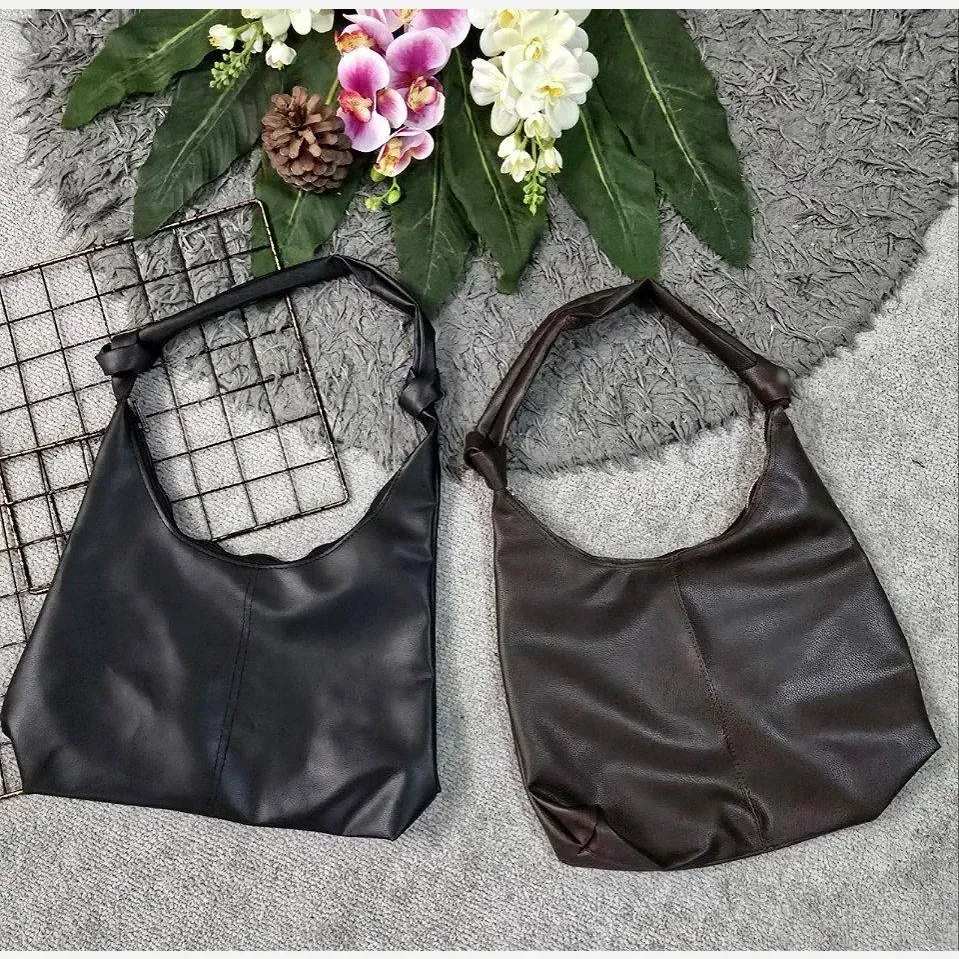 کیف چرمی بند گره ای زنانه مشکی و موکا آزاد سبک جادار