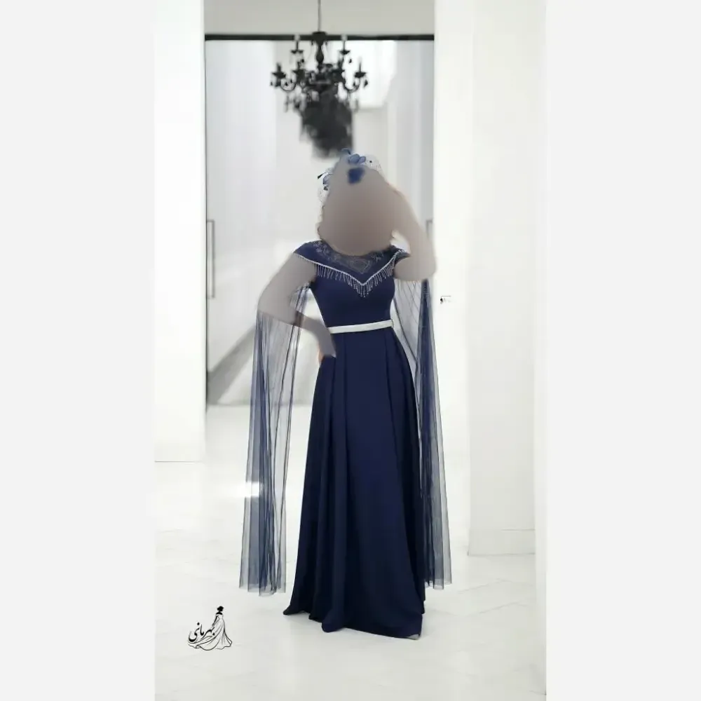 پیراهن ماکسی زنانه فرشته فرمالیته با نگین دی ام سی و ریسه سایزبندی 38 تا 48 جنس کرپ دالقیچ گرم بالا