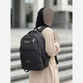 کوله پشتی دبیرستانی برزنتی درجه یک با جای لپ تاپ و دو جیب قمقمه در دو رنگ FILA و CAT