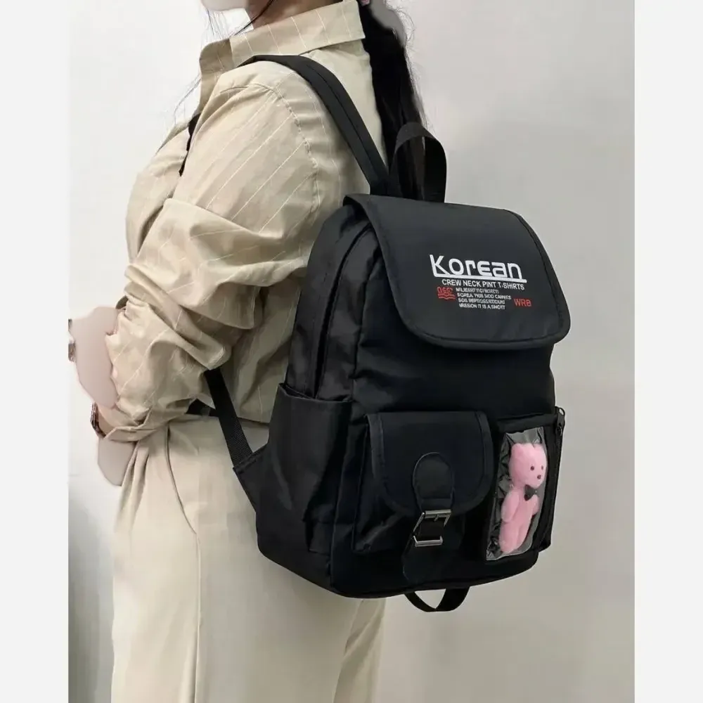 کوله پشتی چرم مشکی زنانه طرح عروسکی اندازه 40x35 سانت