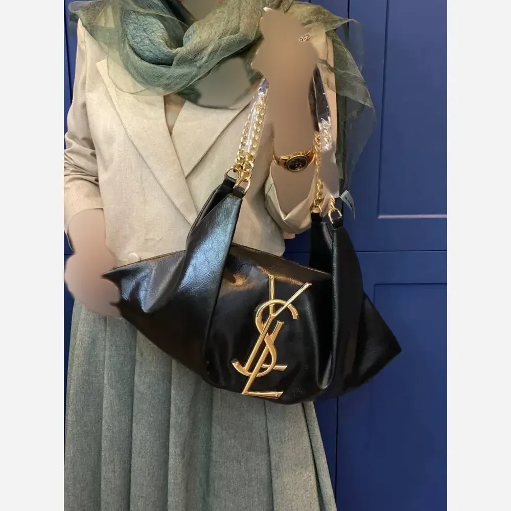 کیف چرم یاشیل طلایی سایز آزاد 50*25 سانتیمتر