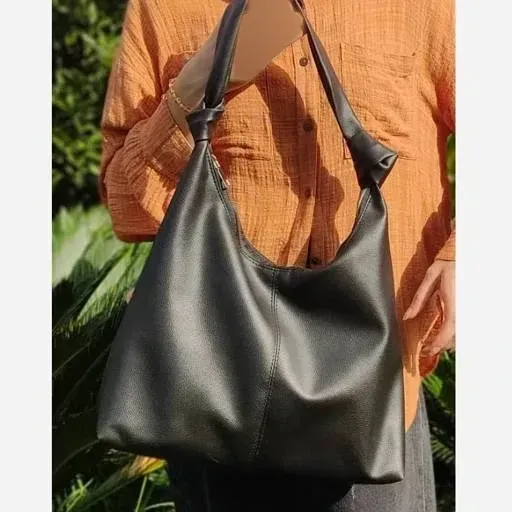 کیف بند گره ای چرم سبک و جادار رنگ مشکی و موکا