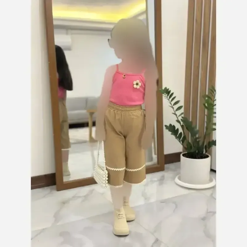 ست گلبرگ دخترانه مناسب 2 تا 9 سال تاپ فانریپ و شلوارک لینن نچرال در 4 سایز