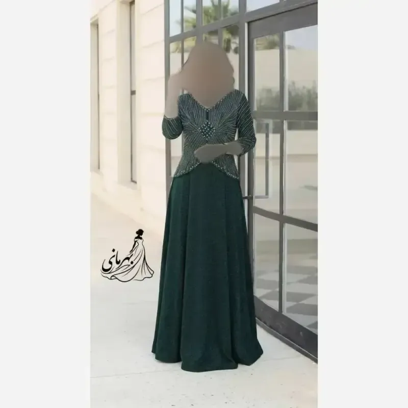 پیراهن مجلسی زنانه روناک کاپدار دیزاین شده با نگین و مروارید سایزبندی 42 تا 58 قد 150 لمه درجه یک