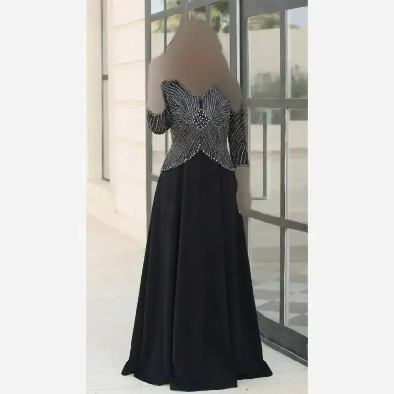 پیراهن مجلسی زنانه روناک کاپدار دیزاین شده با نگین و مروارید سایزبندی 42 تا 58 قد 150 لمه درجه یک