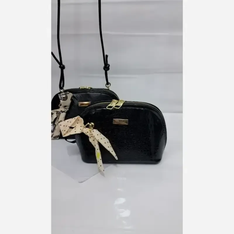 کیف دخترانه چرم ورنی هایا بند دوشی سایز 20 در 12
