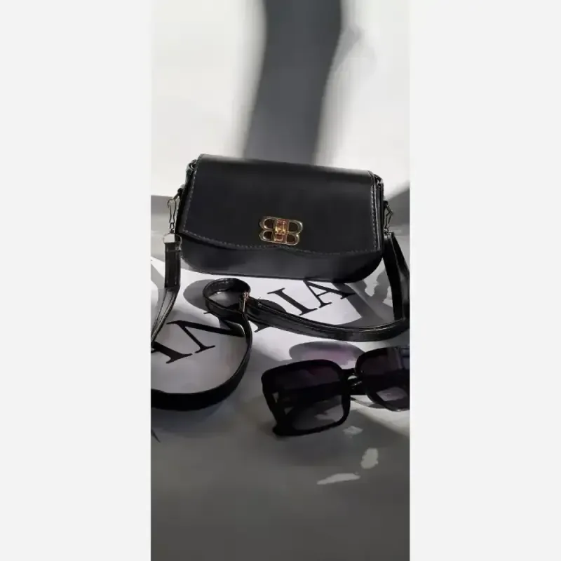 کیف چرم زنانه مدل مانیا رنگ مشکی سایز 15 در 20